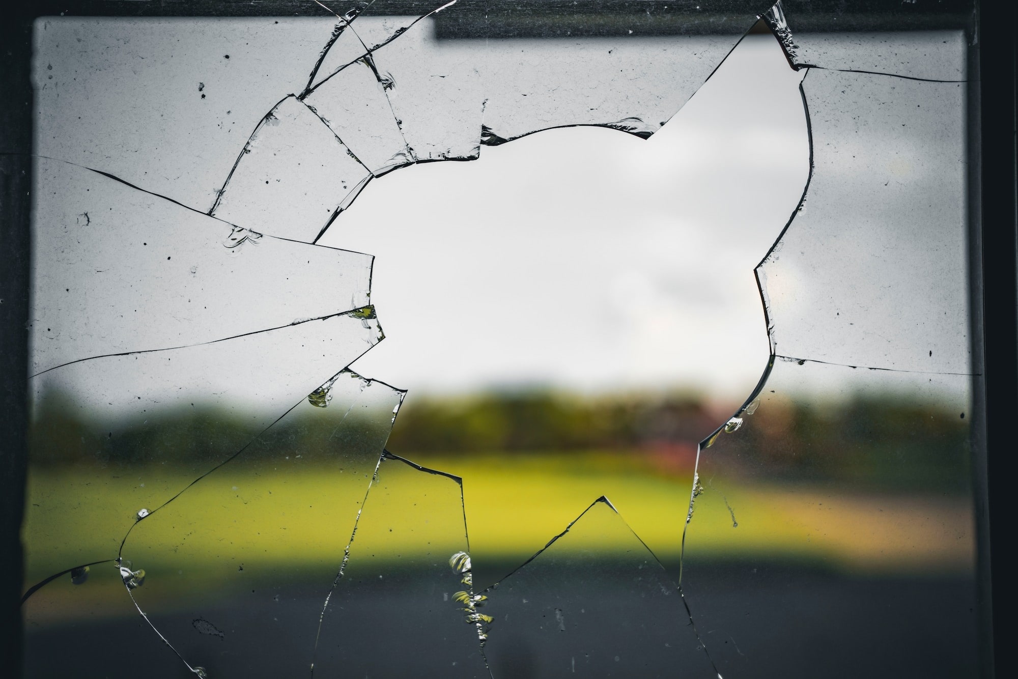 close up of broken window on repair serves page